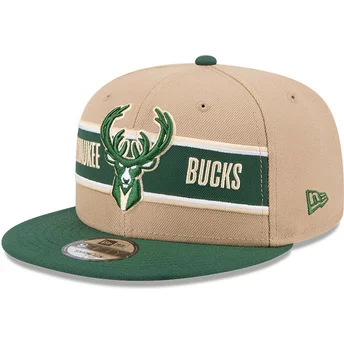 Boné plano castanho e verde snapback 9FIFTY Draft 2024 da Milwaukee Bucks NBA da New Era