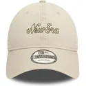 bone-curvo-bege-ajustavel-9twenty-heritage-script-da-new-era
