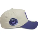 bone-curvo-bege-e-violeta-snapback-com-logo-violeta-9forty-a-frame-world-series-patch-da-los-angeles-dodgers-mlb-da-new-era