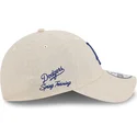 bone-curvo-bege-ajustavel-com-logo-azul-9twenty-linen-spring-training-fan-pack-2025-da-los-angeles-dodgers-mlb-da-new-era