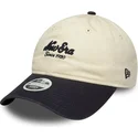 bone-curvo-bege-e-azul-marinho-ajustavel-para-mulheres-9twenty-da-new-era