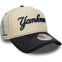 bone-curvo-bege-e-azul-marinho-snapback-e-frame-city-icon-da-new-york-yankees-mlb-da-new-era